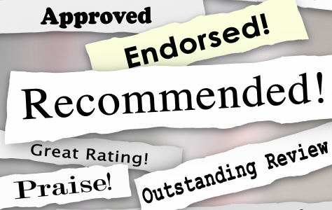 Recommended and other words on torn or ripped headlines such as approved, good review, great rating, praise, endorsed and favorite choice
